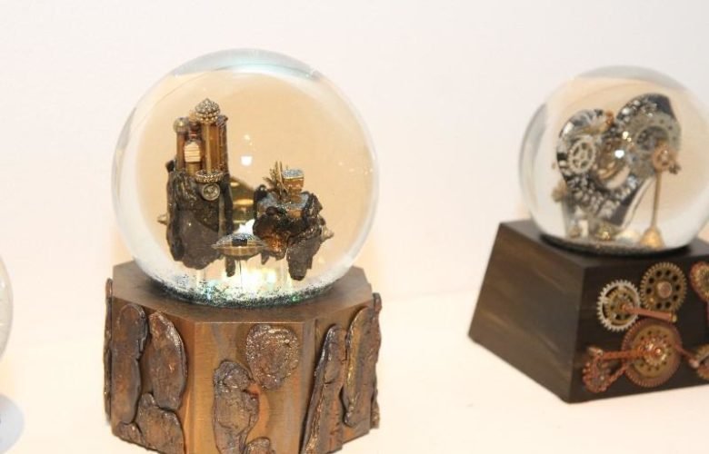 Snow globes created by artists Reid Grossnickle and Cameron Lewis