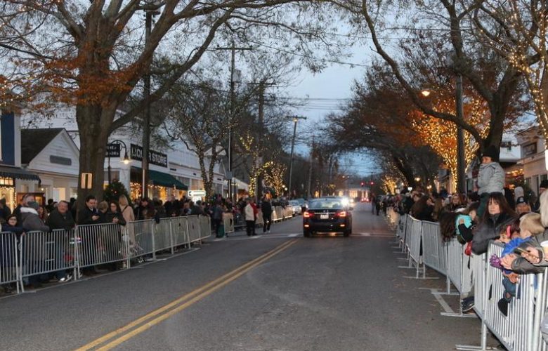 Crowds lined the streets of the village awaiting the start of the parade