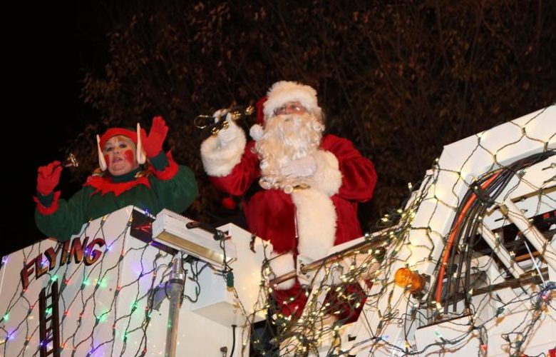 Santa waving to the excited crowd