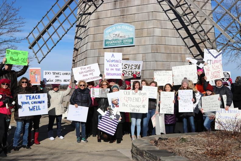 Posing in front of the iconic windmill in Sag Harbor