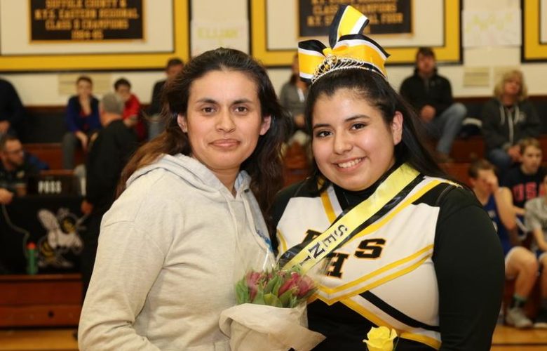 Patricia Figueroa is all smiles as she poses with a family member