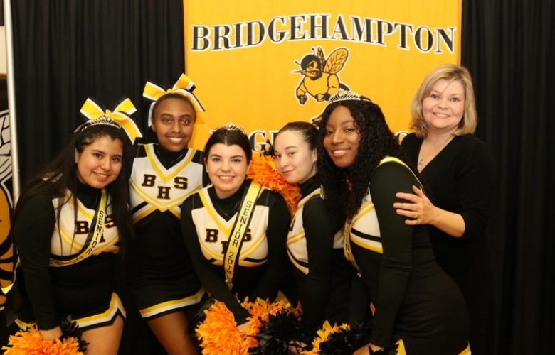 Bridgehampton Varsity Cheerleading Team, senior Patricia Figueroa, tenth grader Jaden Campbell, senior Jade Maldonado, senior Elena Giosi, senior Autumn Street, Coach Jen Maldonado