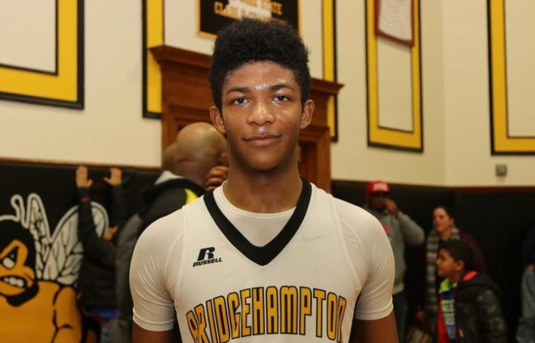 Elijah White wears jersey #1 and was recognized for his triple-double with scoring 13 points, 10 rebounds and 10 assists