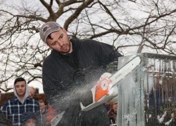 Ice Memories Inc., Long Island's most award-winning ice sculpture company, created numerous ice sculptures that adorned the streets of Sag Harbor for the festival. Pictured, founder of Ice Memories Inc. Rich Daly, takes to the ice