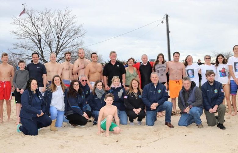 Sag Harbor Ambulance members posed with the participants for this years' Frosty Plunge