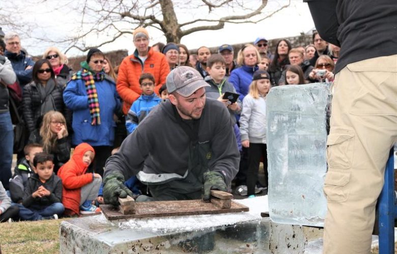 Rich Daly of Ice Memories Inc. of Mastic, prepares the ice for carving