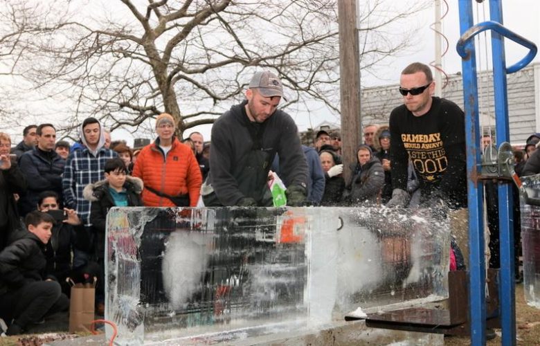 Rich Daly, Certified Master Carver, took to the ice as he created a breaching whale