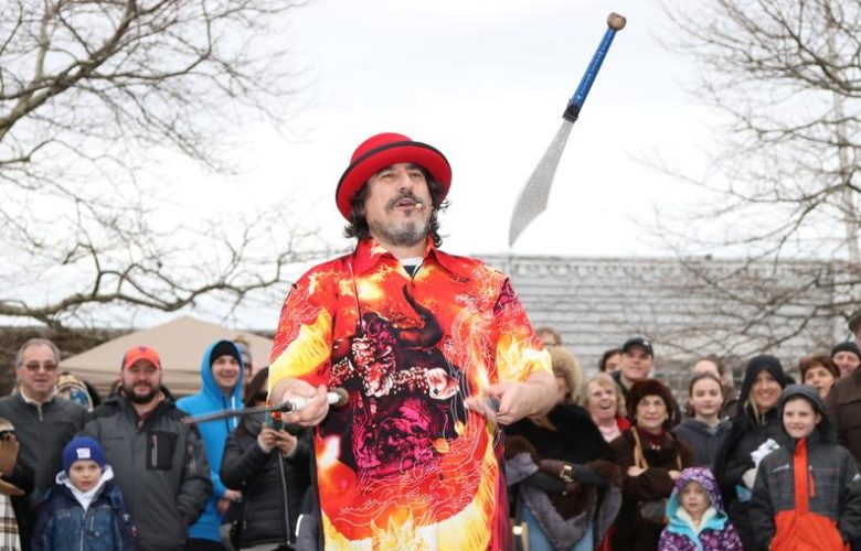Keith Leaf the Amazing Juggler wows the crowd with his knife act