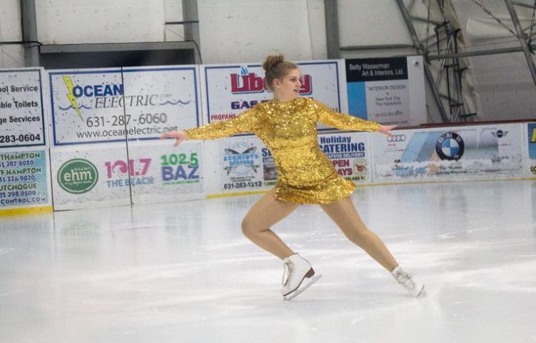 Kaylee Mendelman is glitzy in gold as she performs to "Goldfinger" from James Bond 007