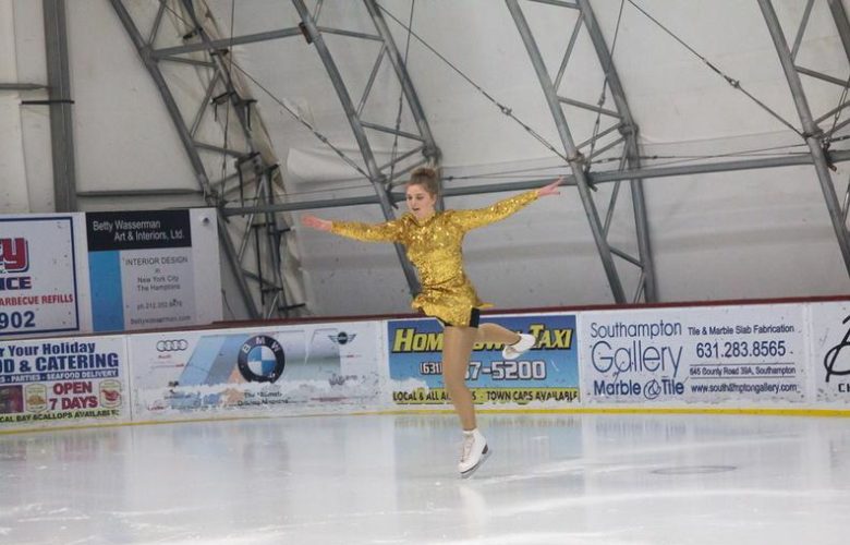 Kaylee Mendelman is glitzy in gold as she performs to "Goldfinger" from James Bond 007