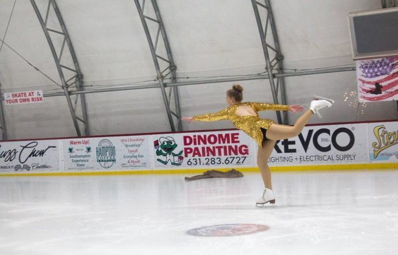 Kaylee Mendelman is glitzy in gold as she performs to "Goldfinger" from James Bond 007