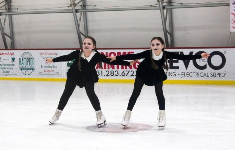 Maxine Boeding and Mackenzie Speece are scary skating to "Adams Family Theme Song