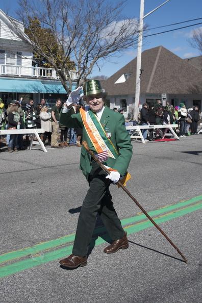 Grand Marshal and Korean War veteran Peter Cuthbert salutes