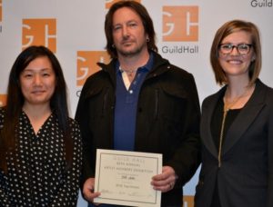 Guest Juror, Connie H. Choi with Top Honor Winner Jeff Muhs and Curatorial Assistant Casey Dalene