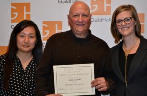 Guest Juror Connie H. Choi with Best Photograph winner Gerry Giliberti and Casey Dalene, Guild Hall Curatorial Assistant