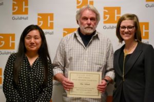 Guest Juror Connie H. Choi with John A. Stefanik, winner of the Catherine & Theo Hios Best Landscape award with Casey Dalene, Curatorial Assistant