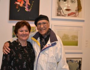 Christina M. Strassfield with artist Athos Zacharias, a past two-time exhibition winner