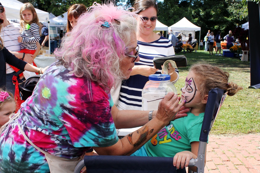 Mia Mastropierro gets her face painted at Fancy Faces by Kathy