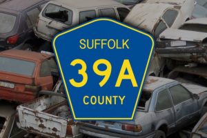 39A sign and crashed cars
