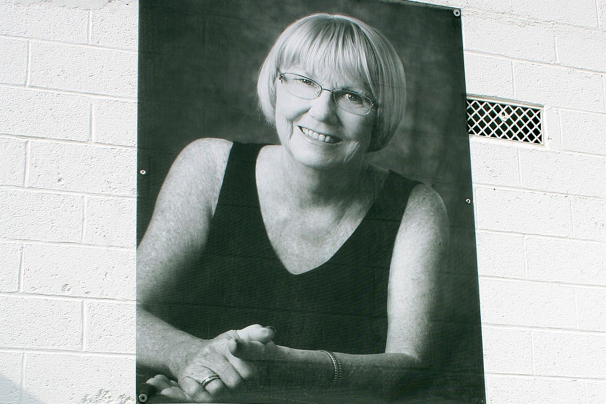 A portrait Mary Ann Tupper by Jennifer Meihoffer hangs at Schmidt's Market.