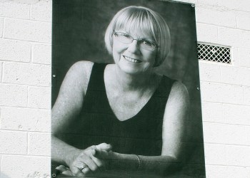 A portrait Mary Ann Tupper by Jennifer Meihoffer hangs at Schmidt's Market.