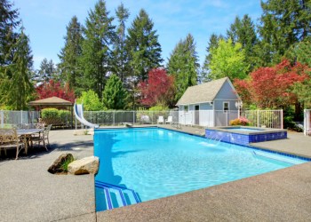 View of backyard with swimming pool