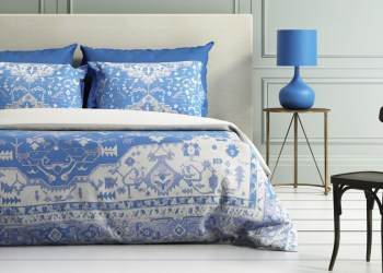 Contemporary elegant luxury atmospheric bedroom with teal wall