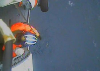 Despite winds gusting to 25-knots and seas reaching nine-feet, the Jayhawk helicopter crew safely hoisted the man aboard and transported him to Air Station Cape Cod where emergency medical services awaited his arrival. (Coast Guard Video by Air Station Cape Cod)