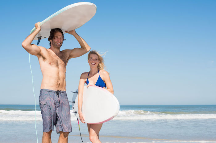surfing couple
