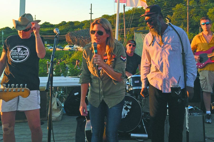 Nancy Atlas performs with Chad Smith of the Red Hot Chili Peppers and Winston Irie.