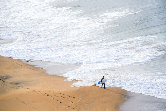surfer on sand