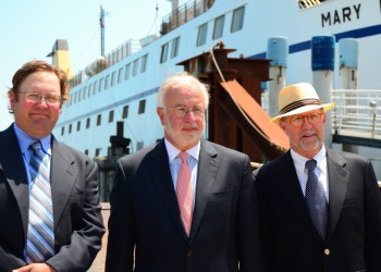 Officials announce the Cross Sound Ferry grant Tuesday.