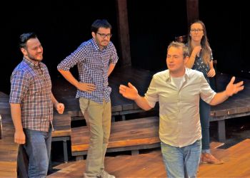 The Upright Citizen Brigade in performance.