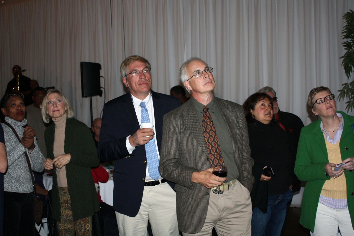 Bill Pell and Eric Shultz watch election results come in at 230 Elm.