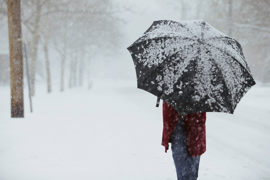 Woman walking in snow