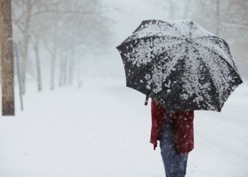 Woman walking in snow