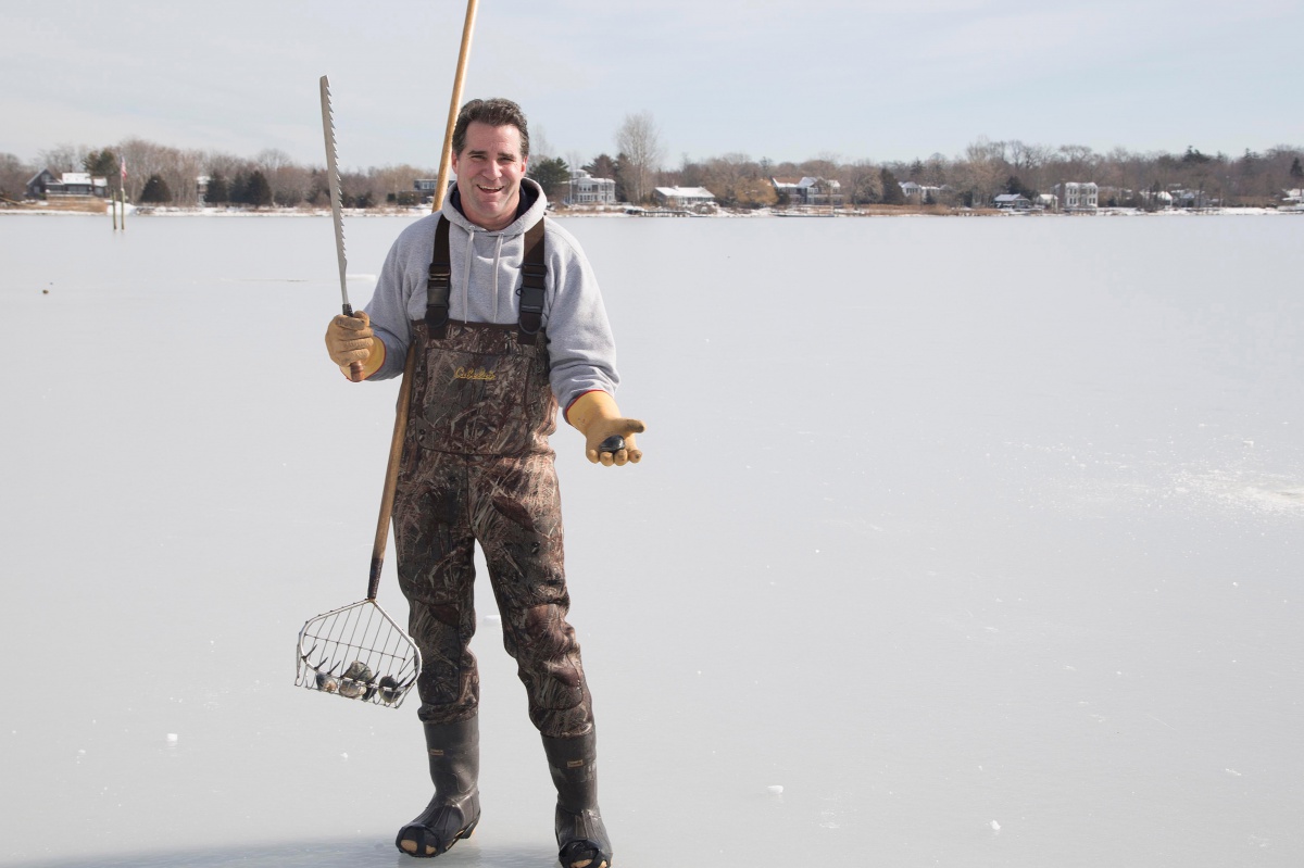 Chef Kerry Heffernan clams in Sag Harbor through a frozen bay.