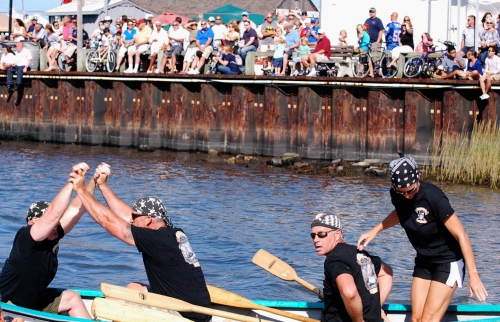 "Team Whalers" defend their title and take first place at the 2012 Harborfest whaleboat race.