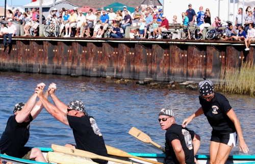 "Team Whalers" defend their title and take first place at the 2012 Harborfest whaleboat race.