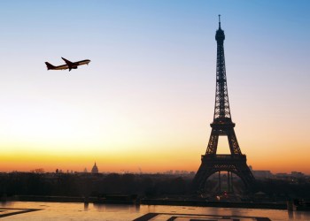 Airplane over Paris travel