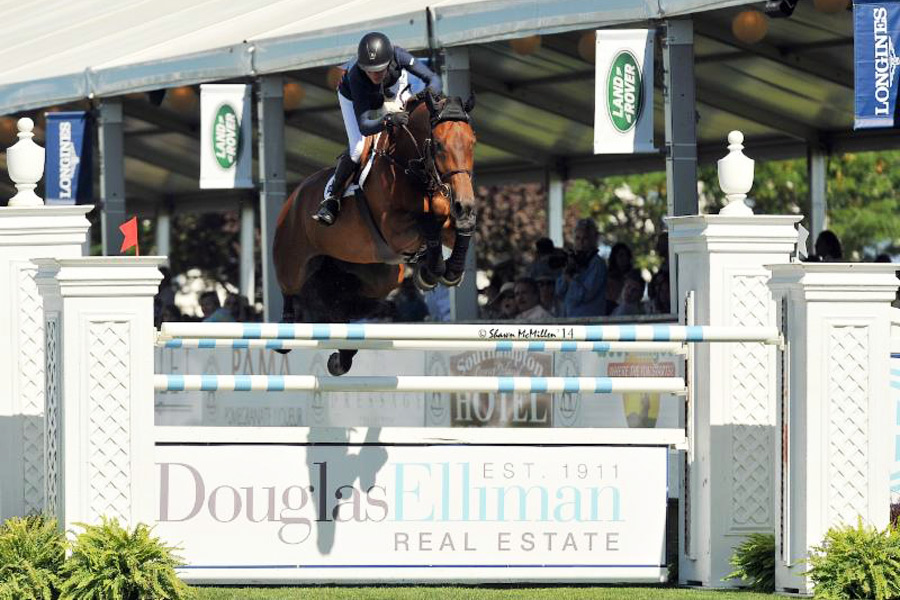 Molly Ashe-Cawley rode Carissimo to victory in the $50,000 Douglas Elliman Grand Prix Qualifier, presented by Longines at the Hampton Classic