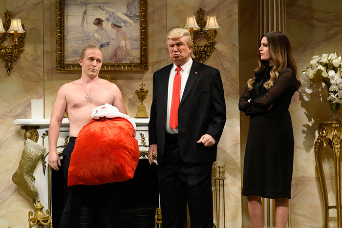 Beck Bennet as Putin, Alec Baldwin as Trump and Cecily Strong as Melania on SNL