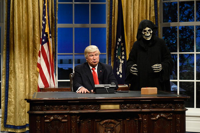 Alec Baldwin as Trump with reaper Steve Bannon on the February 4, 2017 SNL cold open sketch