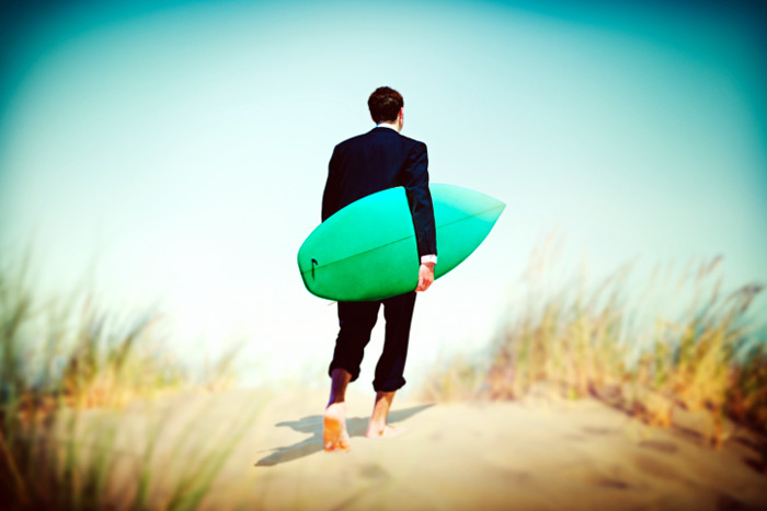 Businessman surfer