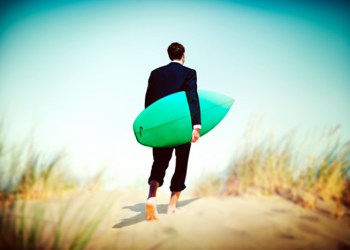 Businessman surfer