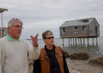 East Hampton Town Supervisor Larry Cantwell visits the Napeague-Lazy Point neighborhood with a resident of Mulford Lane, Amagansett.