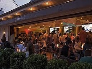 A crowd at the bar at Cittanuova