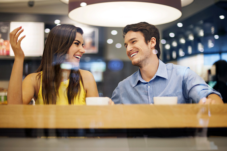 Couple in good conversation at cafe