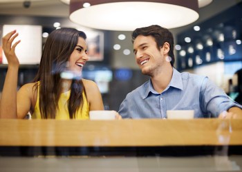 Couple in good conversation at cafe