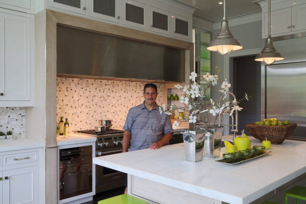 Gary Ciuffo of Ciuffo Cabinetry stands in the kitchen his firm designed for the Hampton Designer Showhouse.